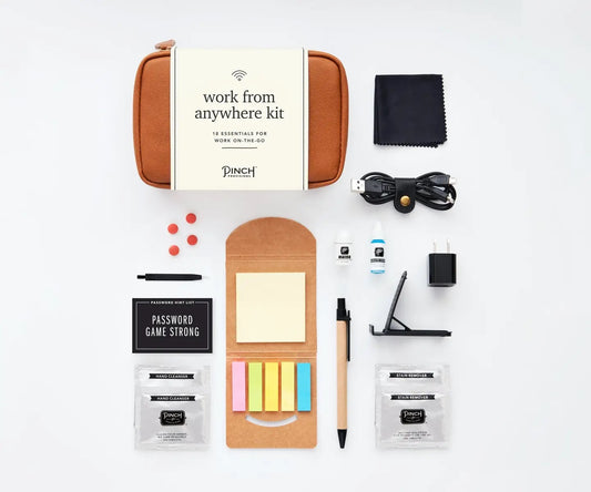 Work From Anywhere Kit in Cognac featuring 18 tech, office, and personal care essentials in a stylish clamshell organizer pouch.