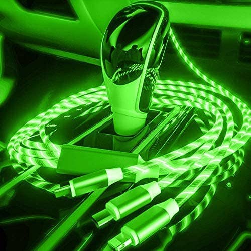 Green USB cable coiled on a car dashboard