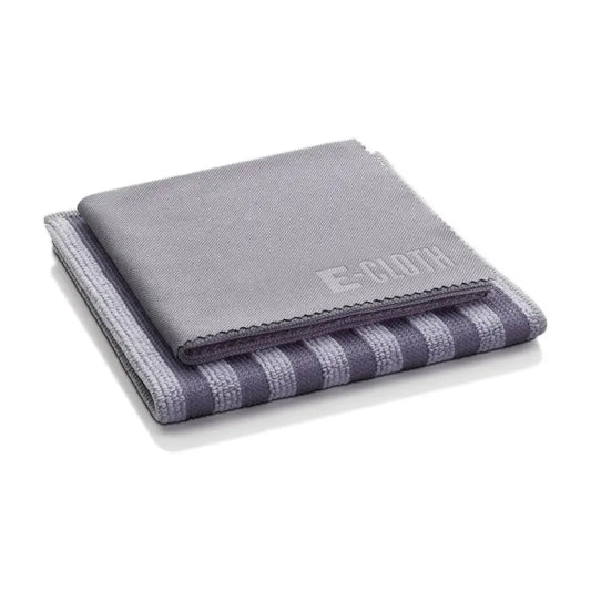 Stacked e-roth microfiber cleaning cloths, one solid gray and one with striped pattern in varying shades of gray.