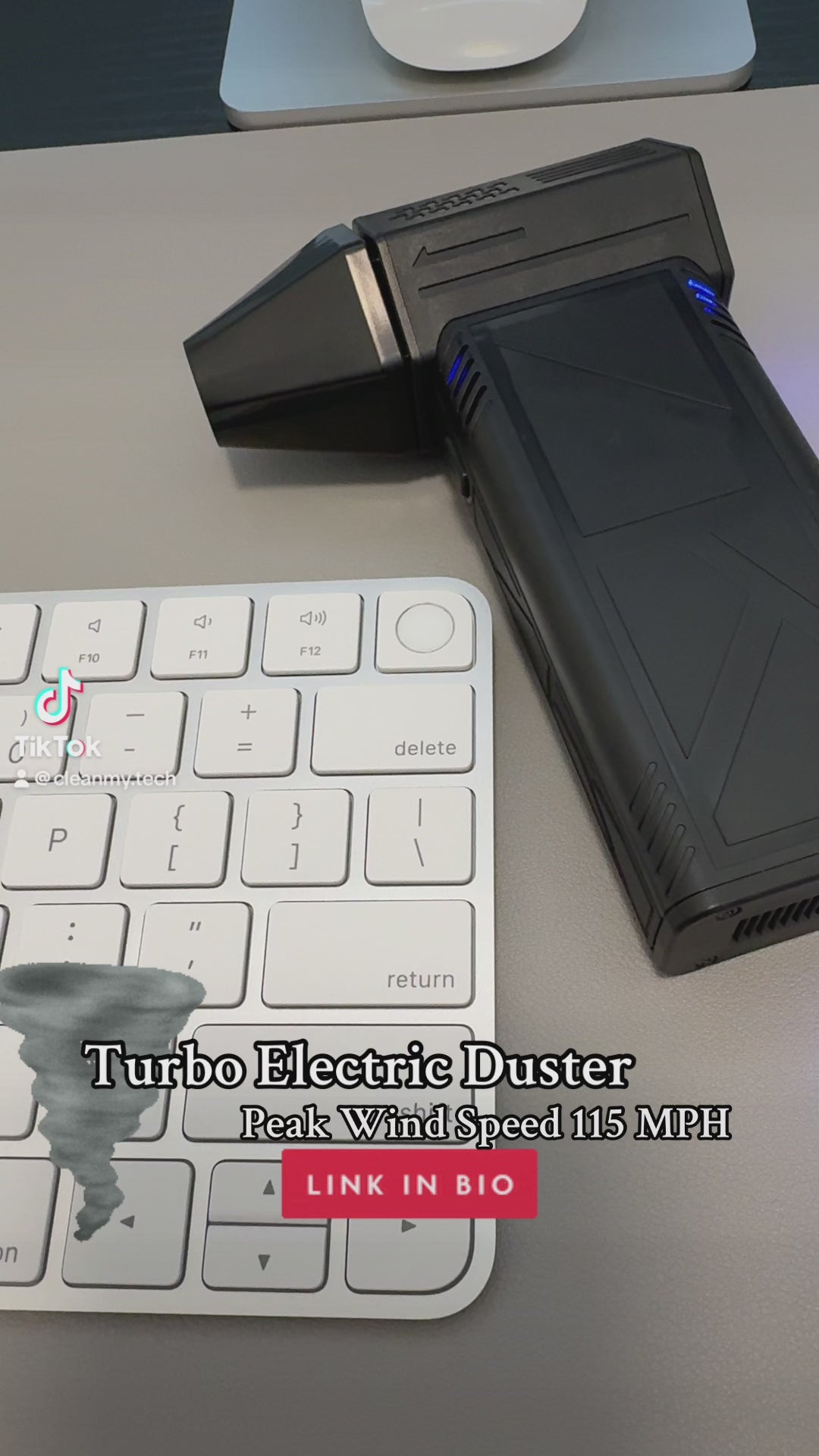 a electric turbo duster blowing a keyboard
