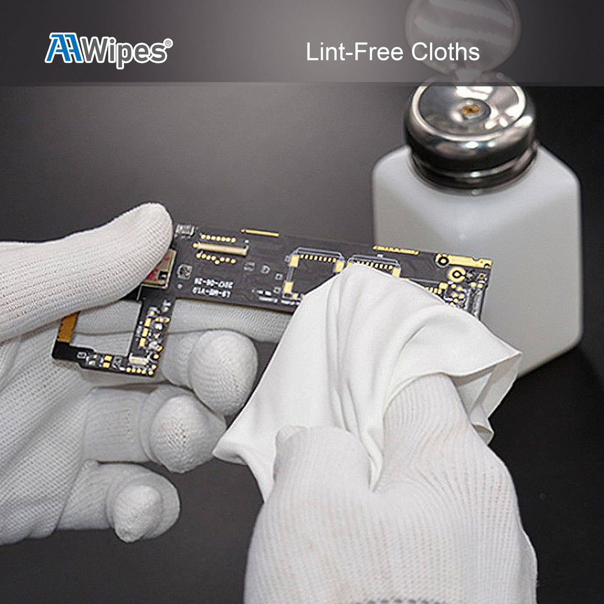 A close-up of gloved hands wiping a small electronic circuit board with a white lint-free cloth, with a white bottle in the background and the text 'AAWipes Lint-Free Cloths' at the top.
