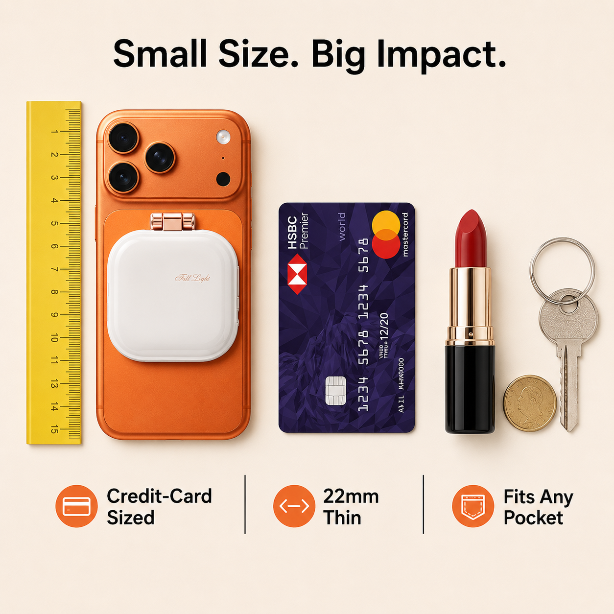 A small white rectangular magnetic pouch shown on an orange phone case, with a yellow ruler, credit card, lipstick, and keys beside it to demonstrate its compact size and pocket-fitting. Text reads 'Small Size.