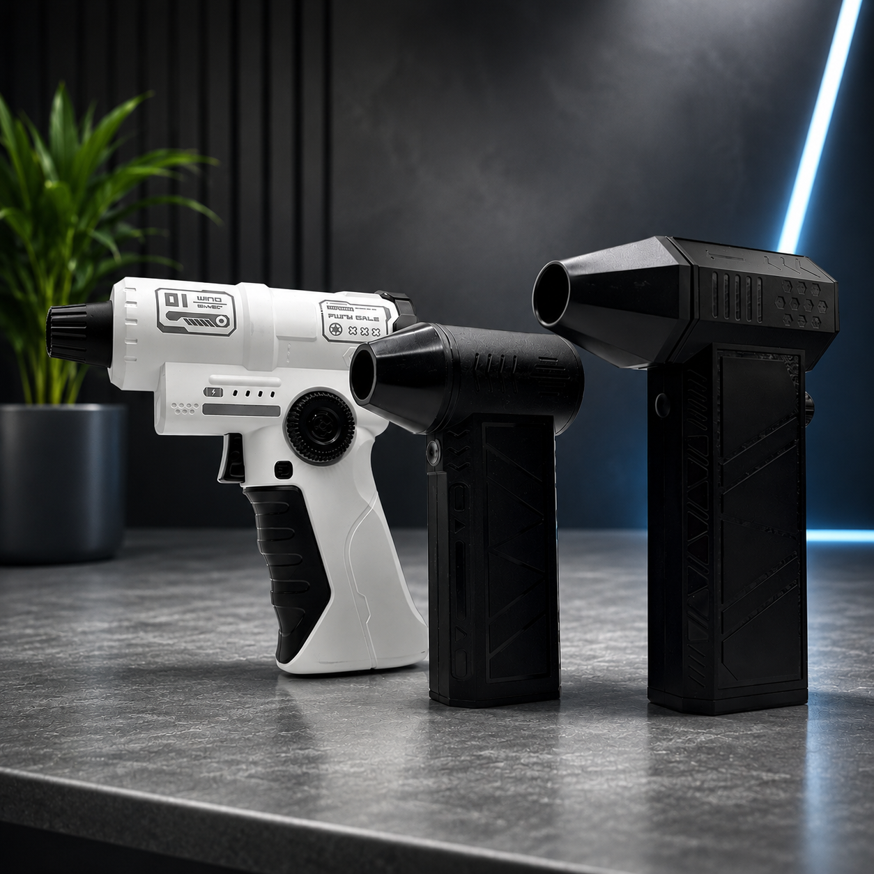3 rechargeable air dusters on a counter with a dark background