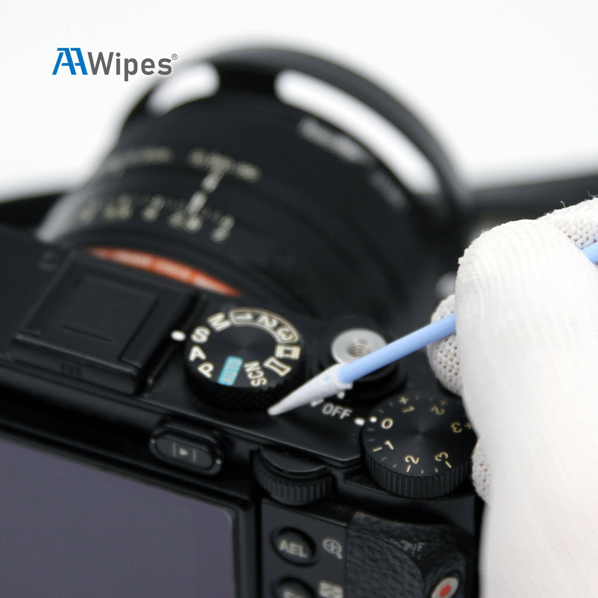 Camera lens being cleaned with a cloth and swab, with 'AA Wipes' logo.