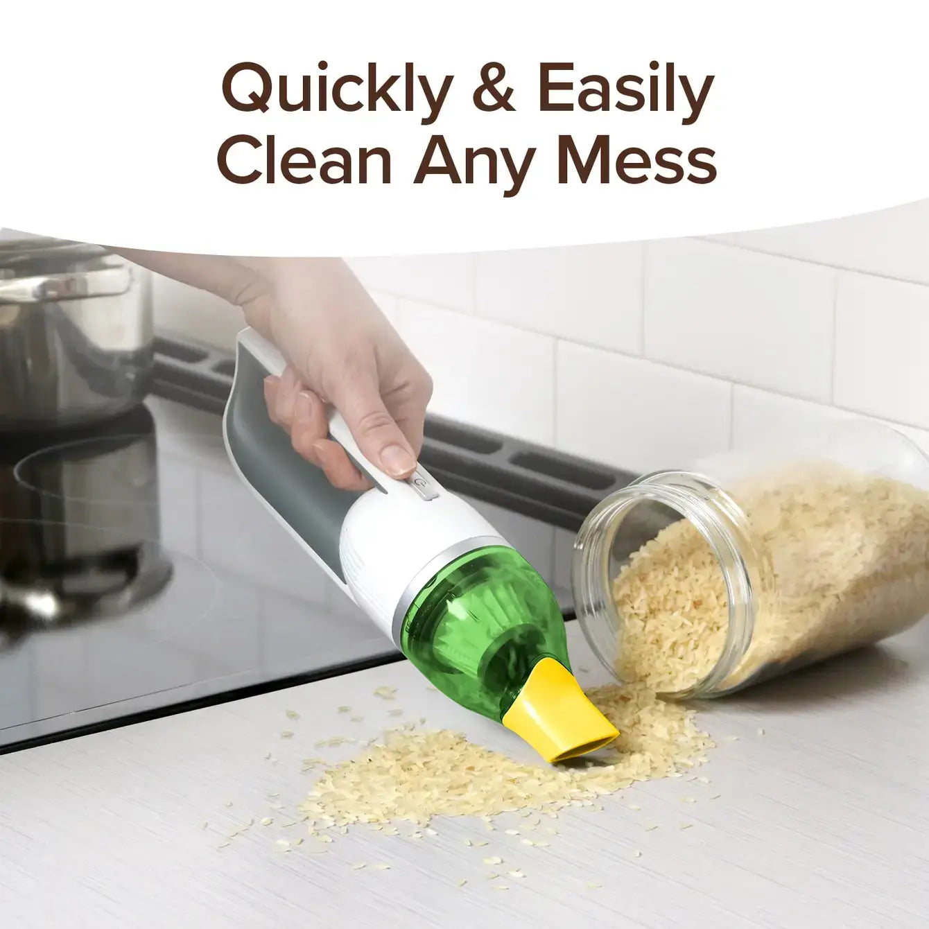 Cleaning tool being used to clean spilled rice from a bottle on a kitchen counter.