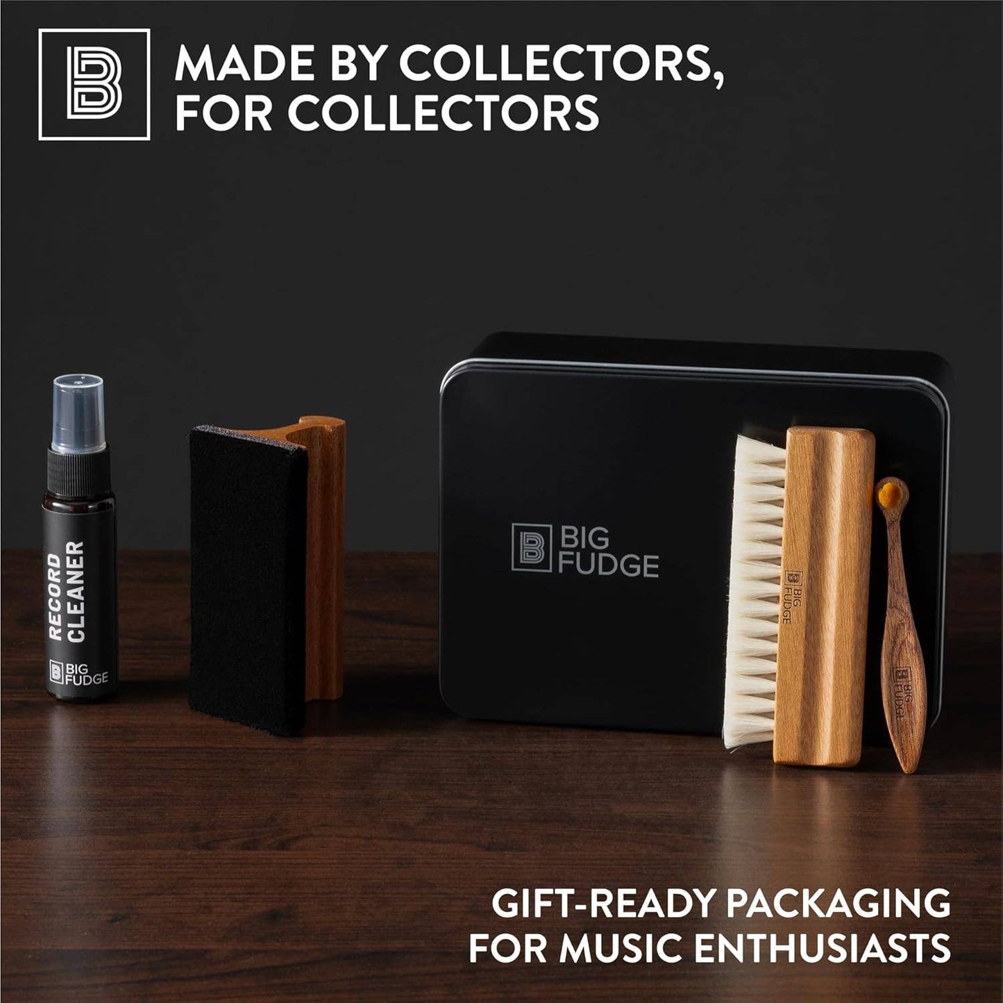 Collection of grooming tools and record cleaner with Big Fudge packaging on a wooden surface.