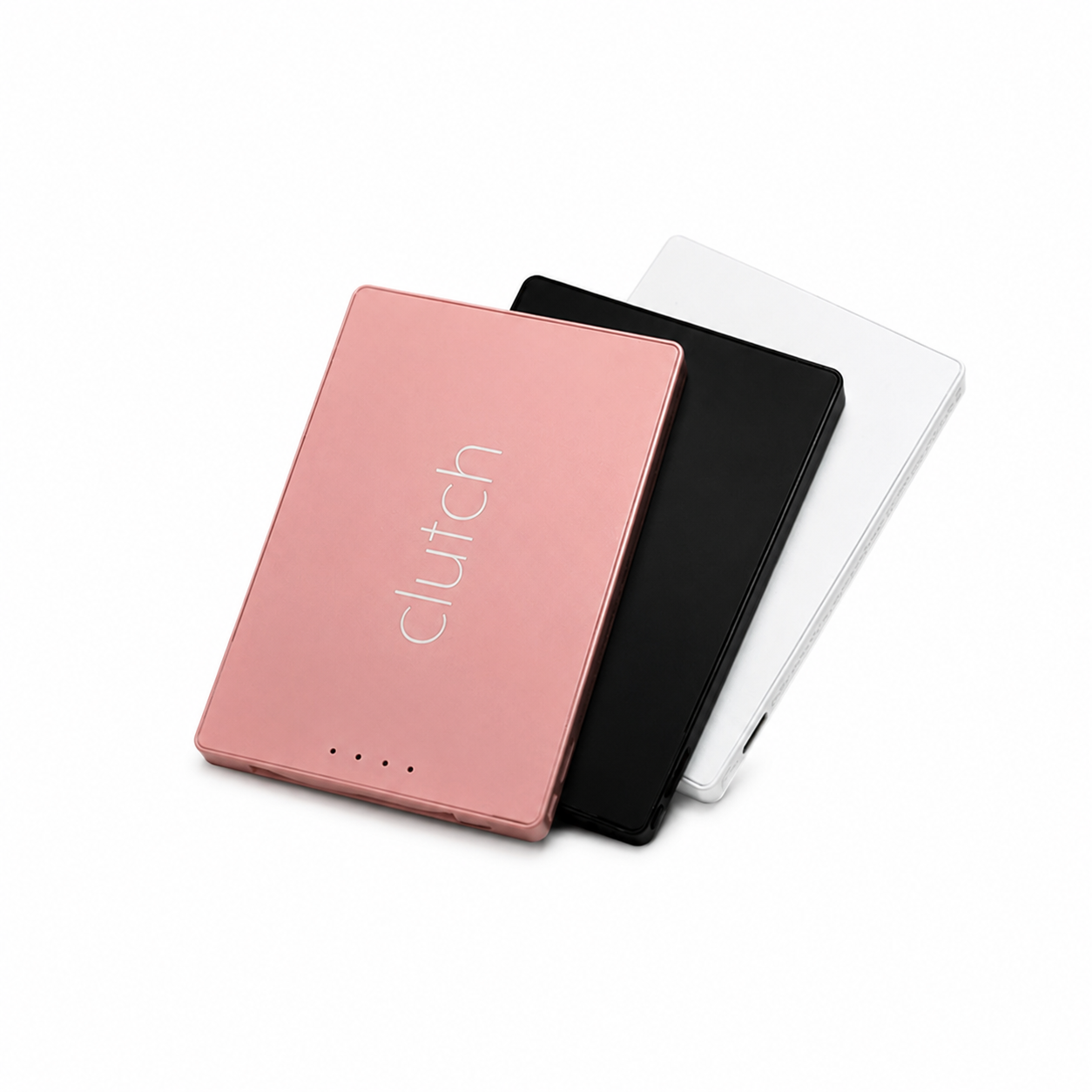 clutch pro usb-c power bank in pink, black, and white on a white background