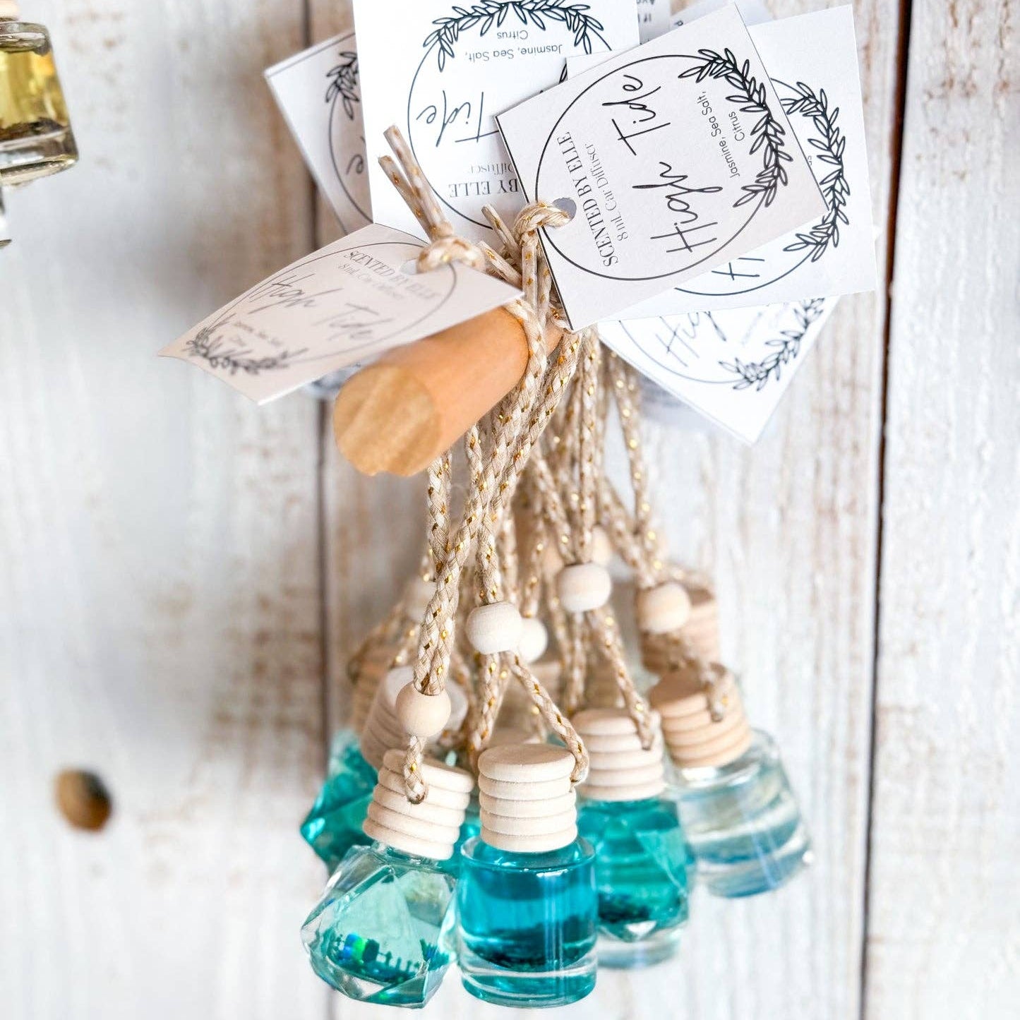 blue bottles and natural elements on a wooden surface