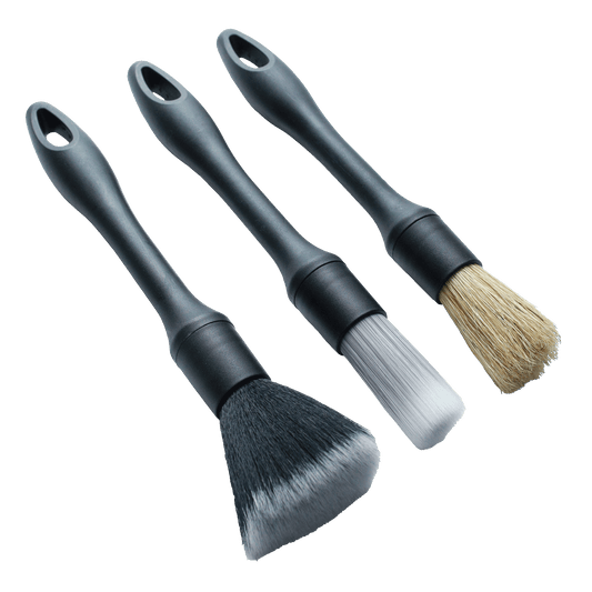 3 car detailing brushes on a white background