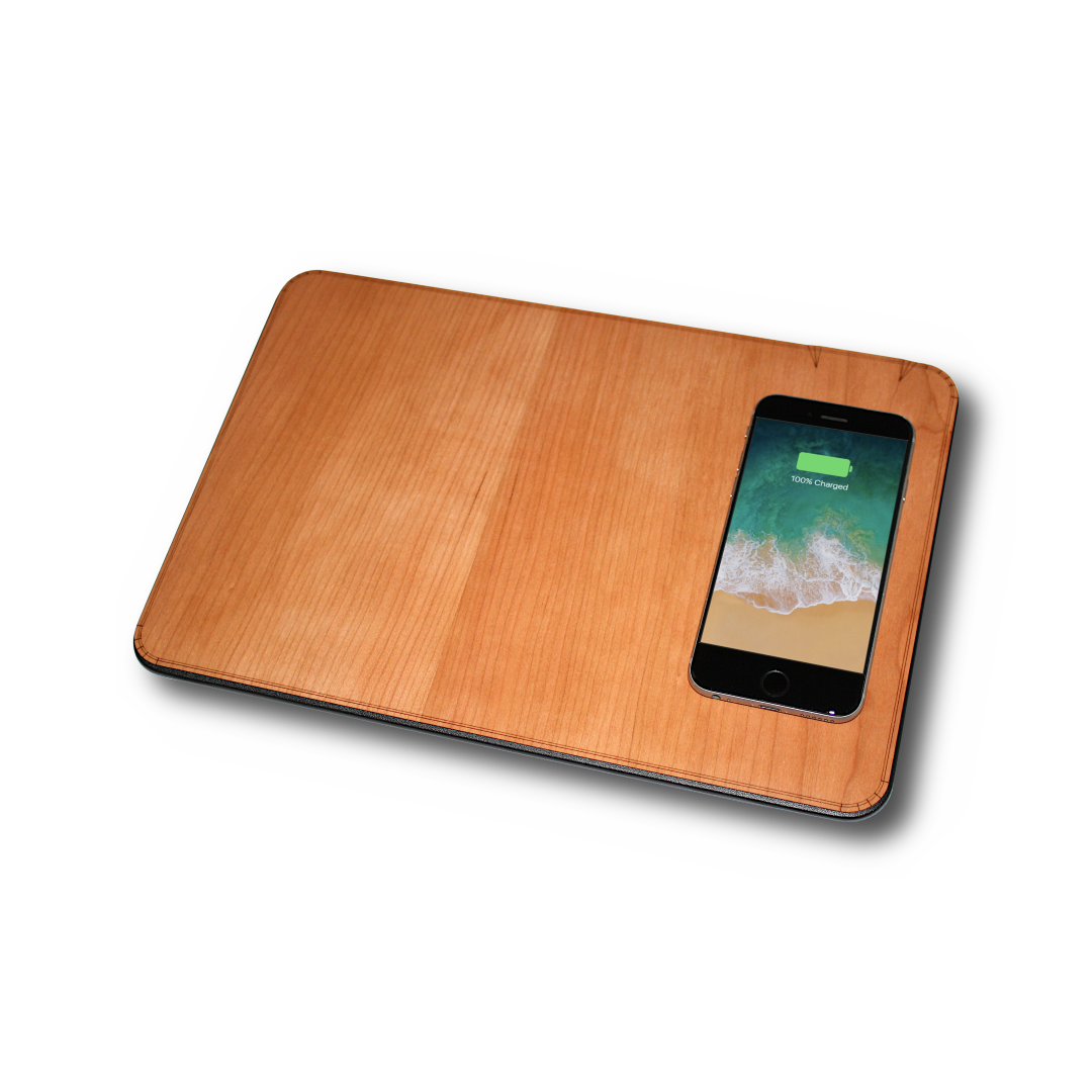 WUDN large real wood wireless charging mouse pad with built-in 15W Qi fast charger, with a phone charging on it