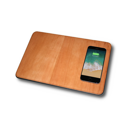WUDN large real wood wireless charging mouse pad with built-in 15W Qi fast charger, with a phone charging on it