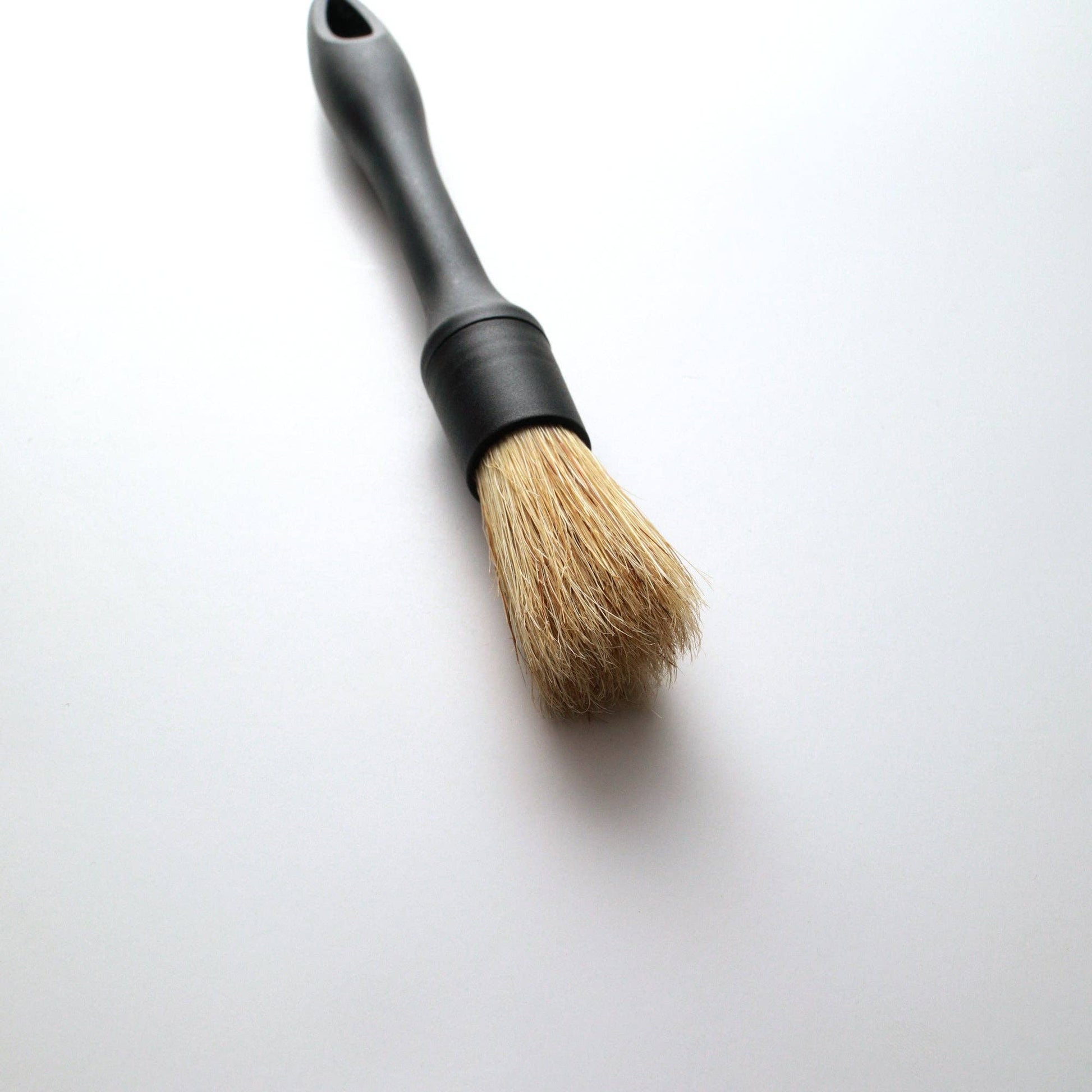 car detailing brush on a white background