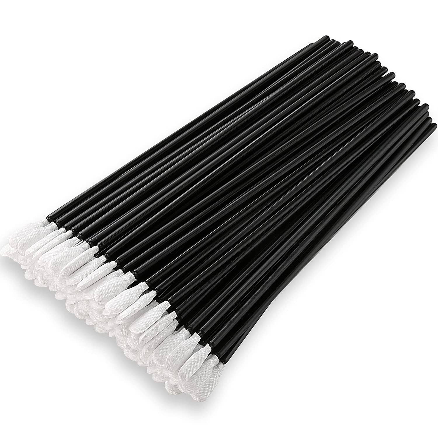 Set of black and white swab sticks on a white background