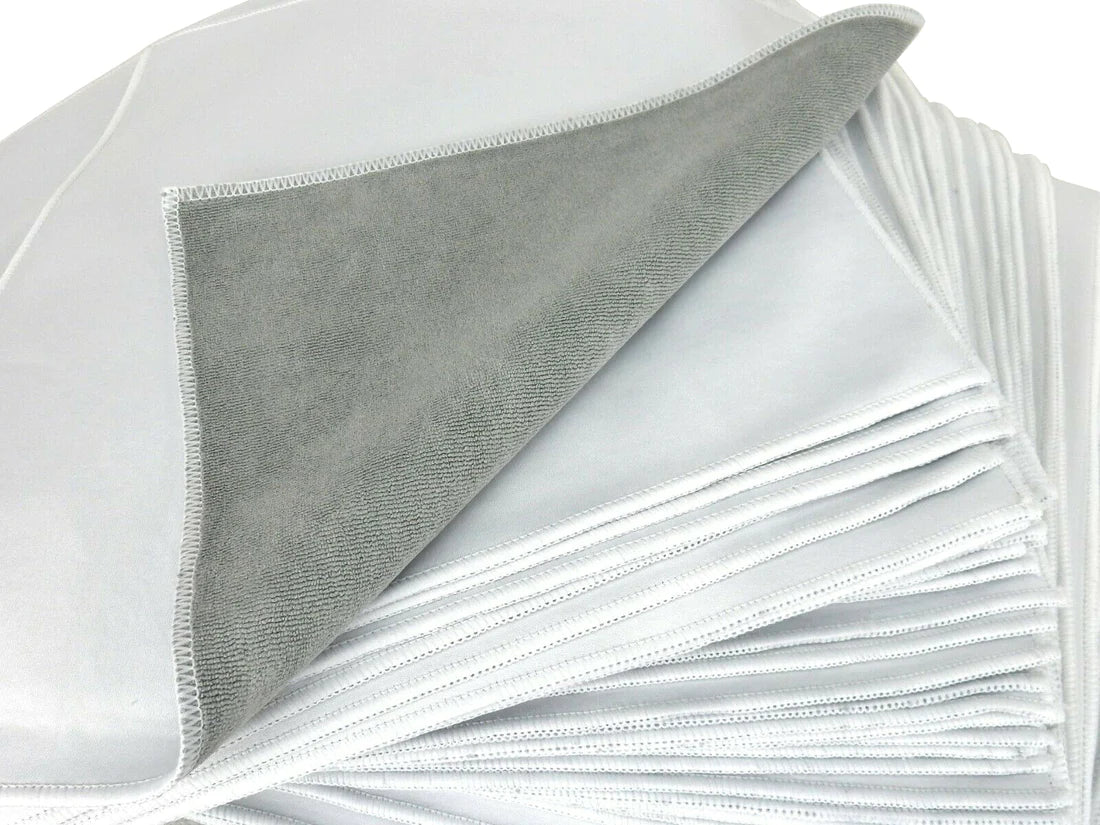 A stack of black and grey large multipurpose microfiber cloths.