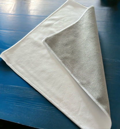 Folded over large white and grey multipurpose microfiber cloth.
