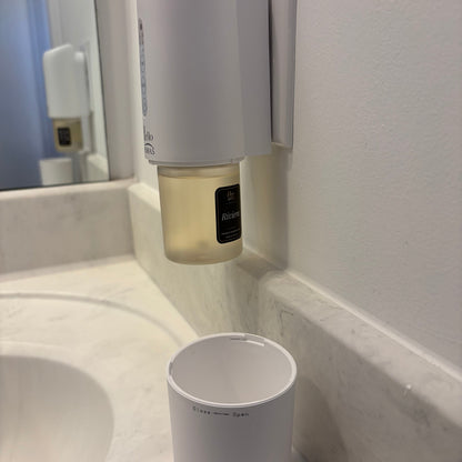 Oil bottle screwed into bottom of diffuser