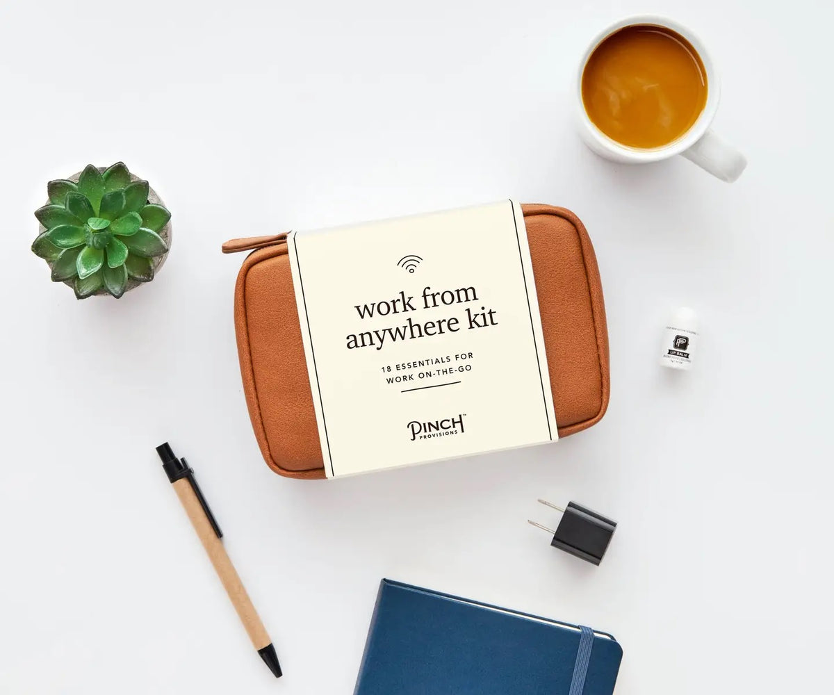 Work From Anywhere Kit in Cognac featuring 18 tech, office, and personal care essentials in a stylish clamshell organizer pouch.