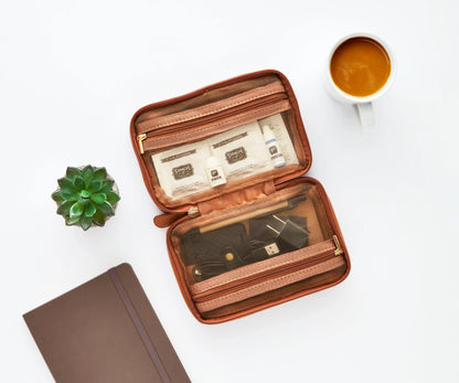 Work From Anywhere Kit in Cognac featuring 18 tech, office, and personal care essentials in a stylish clamshell organizer pouch.