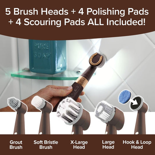 Set of cleaning brushes with various heads and pads, including grout brush, soft bristle brush, and scouring pads, with a background of a glass shelf.