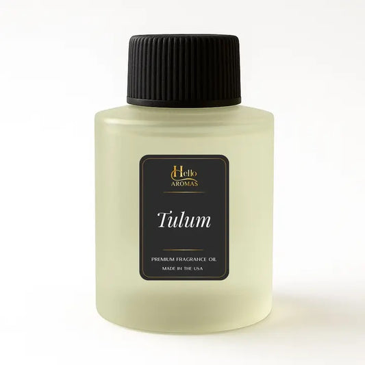 Hello Aromas Tulum premium fragrance oil in a 100ML bottle with black label and cap inspired by Ritz Carlton