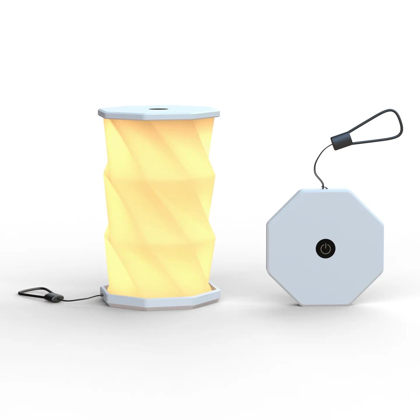 A portable folding lamp  shown on a clean white background. The lamp is unfolded and illuminated with a geometric, faceted design in warm yellow.