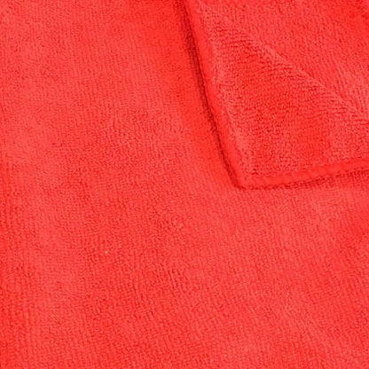 Close-up of a bright red towel with a textured surface.