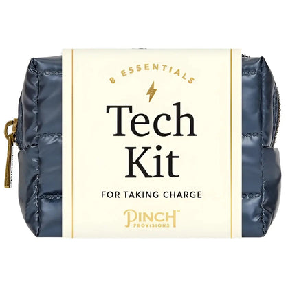 Navy blue quilted tech kit with gold zipper and branding label