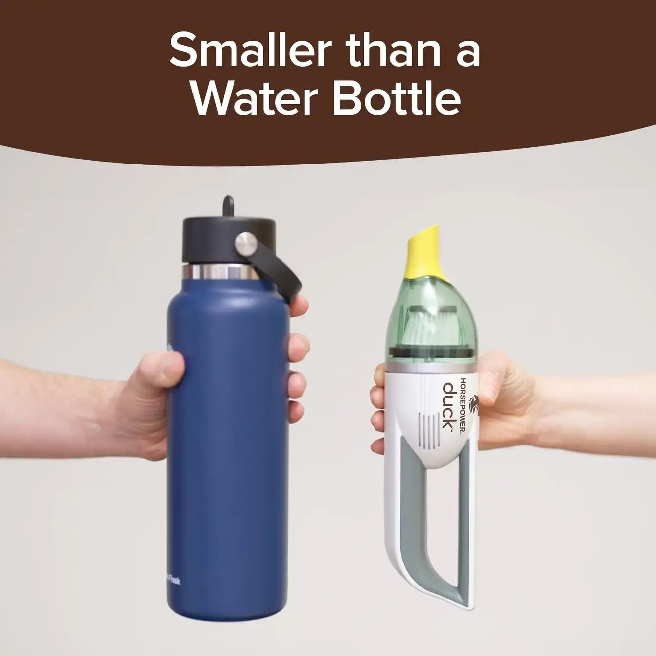 Blue water bottle held by a hand next to a smaller white and green vacuum with 'duck' branding, on a plain background.