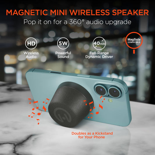Magnetic mini wireless speaker attached to a phone with features highlighted on a blurred background
