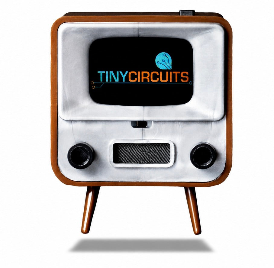 A retro-style miniature television set with a brown wood-grain frame, white faceplate, and two small legs, shown on a white background with a shadow underneath. The screen displays the brand logo 'TINYCIRCUITS'.