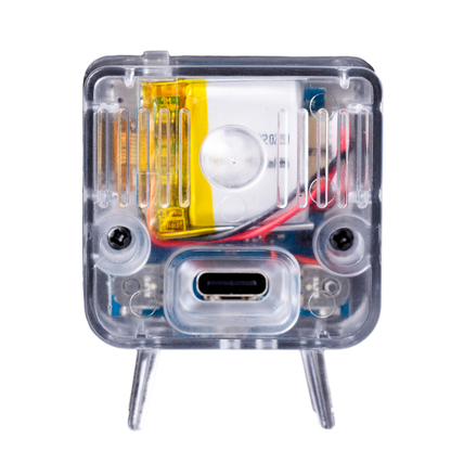 Clear electronic device with internal components on a white background