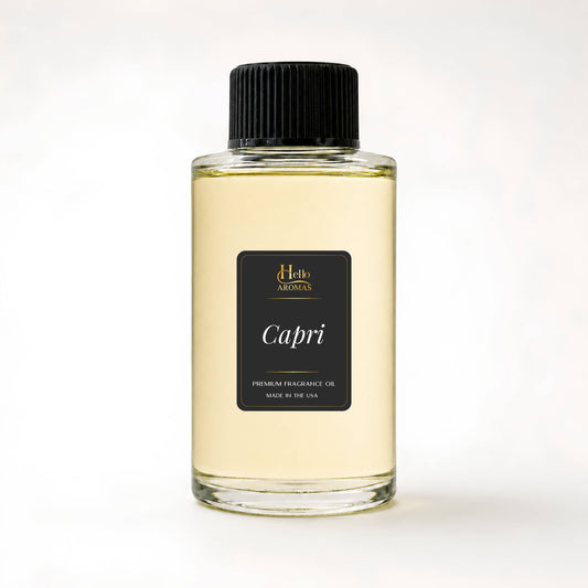 Bottle of 'Capri' fragrance oil with a black cap on a white background