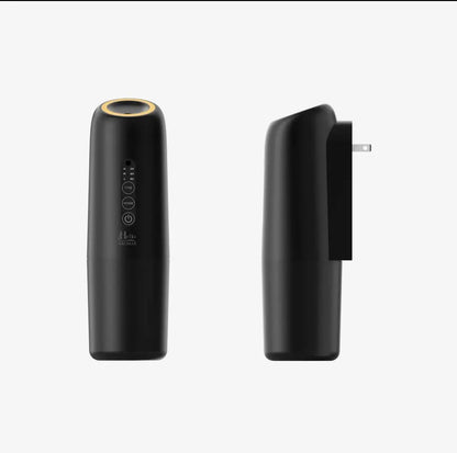 Hello aromas oasis plug-in black cylindrical scent diffuser with gold top and plug-in design for wall mounting