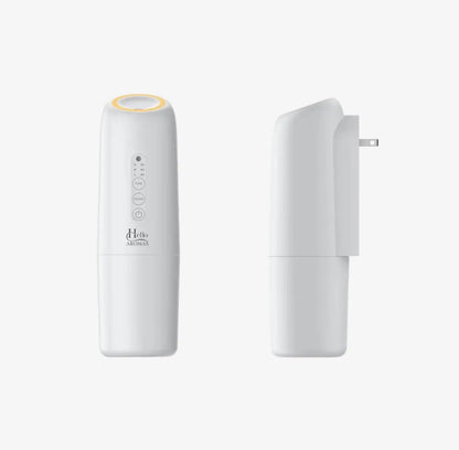 White hello aromas oasis plug-in scent diffuser with a sleek cylindrical design and glowing yellow ring at the top