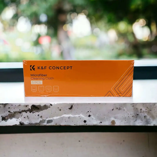 Orange rectangular box of k&f concept microfiber cleaning cloths, packaged with a clear plastic wrap and featuring black text and geometric line design.