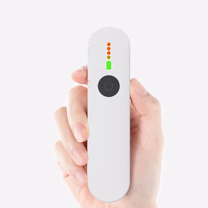 White handheld device with a circular power button and five led indicators above it