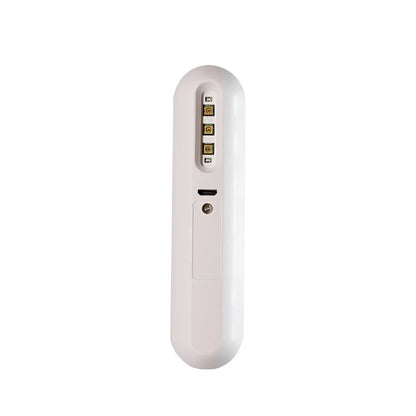 White, sleek, handheld device with a usb-c port and four gold-colored connectors.