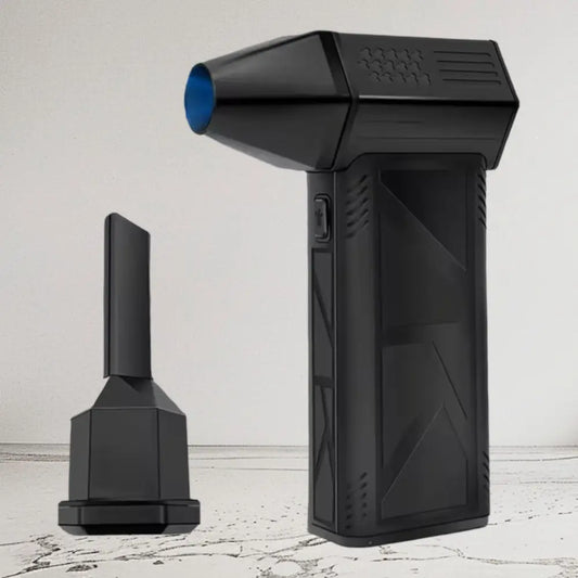 Black handheld air compressor with a blue-tinted nozzle and geometrically textured body, accompanied by its detachable attachment.