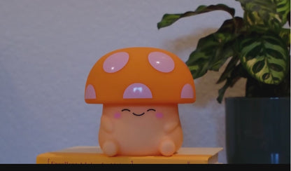 A hand taps the top of mushroom light to demonstrate the brightness levels.