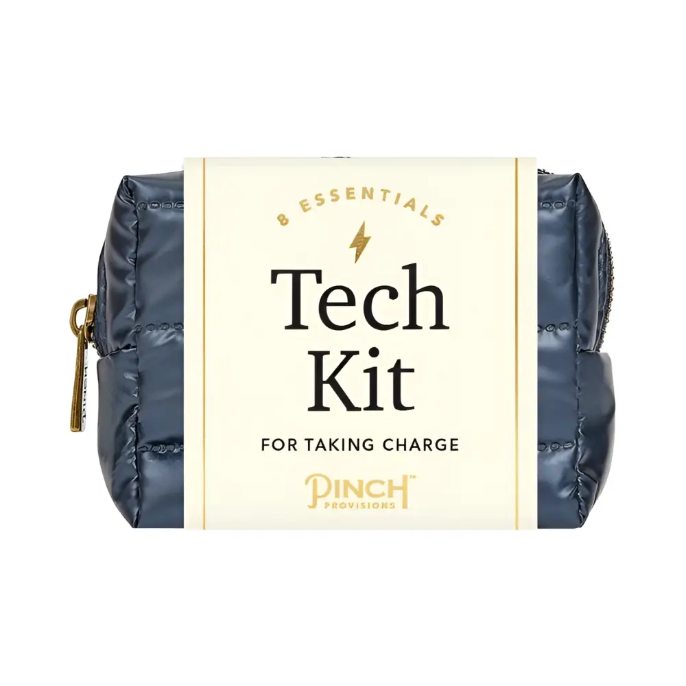 Navy blue quilted tech kit with gold zipper and branding label