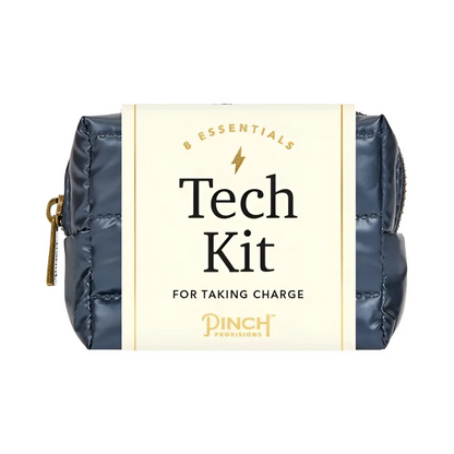 Navy blue quilted tech kit with gold zipper and branding label