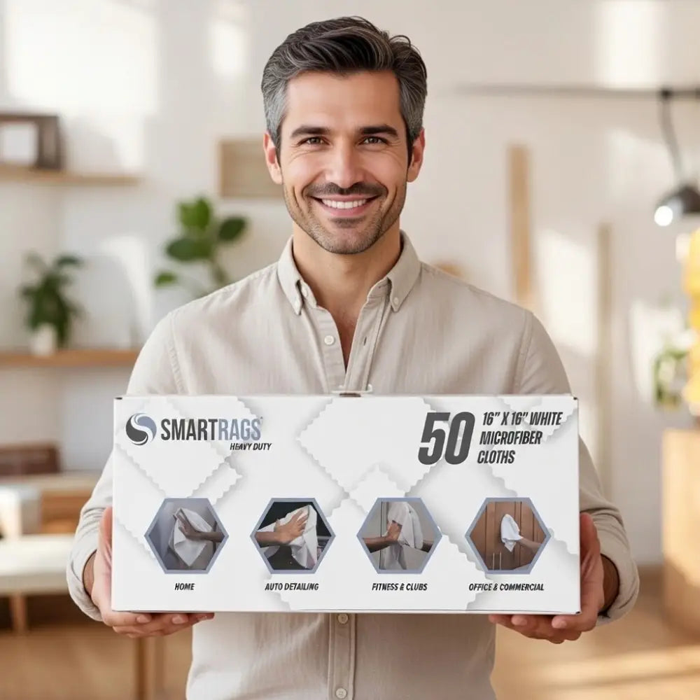 A box of 50 white microfiber cloths from smartrags, designed for heavy-duty cleaning tasks.